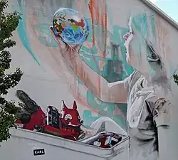 Graffiti Kind mit Weltkugel