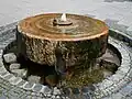Mahlstein als Springbrunnen