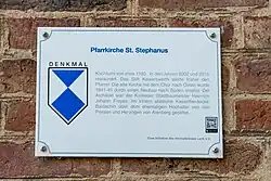 Denkmaltafel an der Kirche St. Stephanus in Lank-Latum
