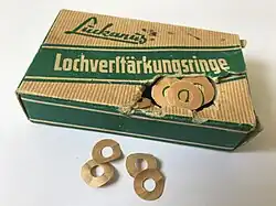 Klebefähig gummierte Lochverstärkungsringe und Spenderbox (DDR)