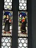 Luther und Calvin im Kirchenfenster