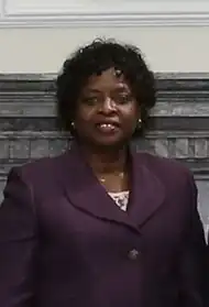 Natália Umbelina 2014, afrikanische Frau im Dunkelblauen Kostüm