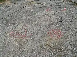 Verschiedene Symbole, Schiff mit Mann, Radkreuz