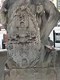 Das Wappen an einem Brunnen