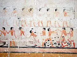 Darstellung von Schlachtern bei der Arbeit an der Grabwand