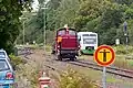 Eine Rhönzügle-Lok (V&nbsp;60) begegnet im Bahnhofsvorfeld einem Regio-Shuttle der EB als RB40 Meiningen-schweinfurt