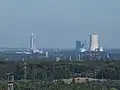 Im Norden die Chemieanlagen von Rütgers, die Lambertuskirche in Henrichenburg, dahinter das Kraftwerk Datteln