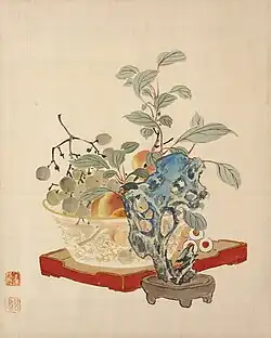 Früchte und Taihu-Stein