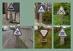 Zusammenstellung mehrerer Nachkriegsverkehrszeichen in Blau auf weißem Untergrund