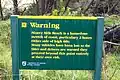 Warnschild an einer Zufahrtsstraße zum Ninety Mile Beach