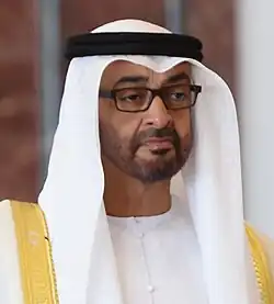 Muhammad bin Zayid al-Nahyan, Präsident der Vereinigten Arabischen Emirate, mit weißer Kufiya.