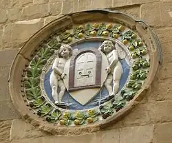Wappen Arte della seta, der Zunft der Seidenweber und Goldschmiede, von Luca della Robbia