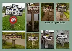 Zusammenstellung verschiedener Michelin-Ortseingangs- und Ortsausgangsschilder