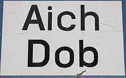 Ortstafel Aich – Dob