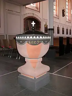 Restauriertes Taufbecken, bez. 1629