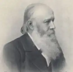 Seitenprofil in schwarzweiß an oberen Brustkorb nach rechts schauend.