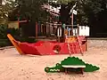 Kinderspielplatz im Park, im Hintergrund das Musée Roybet Fould