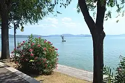 Statue im Lago Trasimeno vor Passignano
