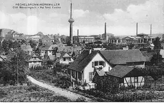 Raffinerie Pechelbronn mit Arbeitersiedlung Cité Boussingault im Vordergrund