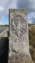 Grenzstein von der Schweizer Seite mit dem Genfer Wappen