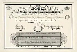Gründeraktie der Prager Eisenbahngesellschaft über 500 Gulden, ausgestellt am 1. Mai 1828 in Prag auf den Fürsten Carl von Loewenstein-Wertheim, im Original unterschrieben u. a. von dem jüdischen Bankier Leopold von Lämel, Großfinanzier des österreichischen Staates. Als technischer Berater dieser Prag-Pilsener-Eisenbahn fungierte der Astronom, Physiker und Pionier des Eisenbahnbaus Franz Josef von Gerstner.