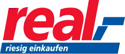 Logo mit dem ersten Slogan „riesig einkaufen“