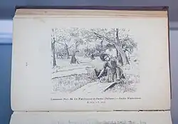 Ein querliegendes aufgeschlagenes Buch, leicht vergilbt. Die Abbildung auf der Seite zeigt eine Skizze mit Rasdenbleicherinnen, eine Person mit Wäsche dominant im Vordergrund