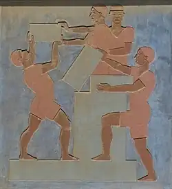 4. Maurer bei der Arbeit.