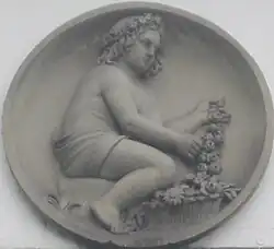 Nr. 25: Blütenkranz flechtender Knabe