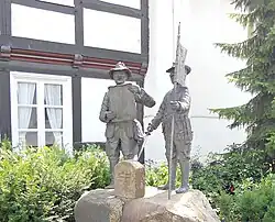 Schnadedenkmalmit Johannes Martini und Heinrich Schieferecke