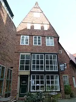 Haus Störmer, Hinter der Holzpforte 1, oben ~ 1550, unten ~ 1805