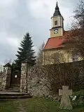 Barockkirche und mittelalterliches Steinkreuz in Naundorf
