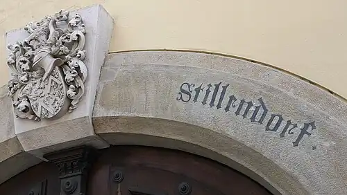 Torbogen am Ansitz Stillendorf in Bozen in Frakturschrift, um 1900