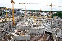 Bauarbeiten am Milaneo im Juli 2013, am rechten unteren Bildrand ist der Tunnel im Rohbau zu sehen