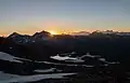 Sonnenaufgang über dem Wildenkogel. Im Hintergrund der Großglockner.