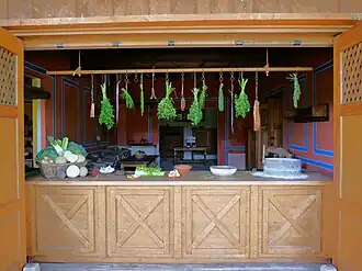 Tabernae mit Gemüseaushang