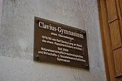 Clavius-Gymnasium ehem. Oberrealschule. 1879/80 von Karl Georg Lang anstelle des ehem. Kapuzinerklosters errichtet. Seit 2004 Naturwissenschaftlich-technologisches und Wirtschafts- und Sozialwissenschaftliches Gymnasium