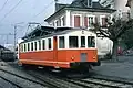 Orange/weisser BDe 4/4 12 in Orbe, 1980