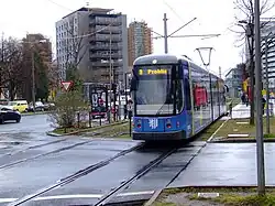 Eine Niederflur-Straßenbahn der Linie 9 an der Haltestelle Walpurgisstraße, 2011