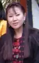 Tshering Yangdon. Eine junge Frau mit langen glatten Haaren.