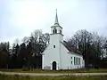 Lutherische Kirche in Vecborne (Gemeinde Kaplava); erbaut von 1936 bis 1939 als Ersatzbau für eine in das Lettische Freilichtmuseum Riga translozierte Holzkirche[5]