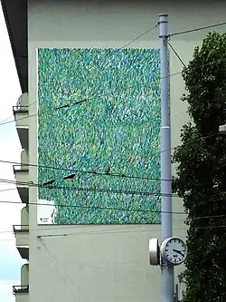 Wandbild Gras 2001. Von Bruno Gasser (1947–2010). Dorenbach-Oberwilertrasse 159, Basel