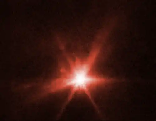 Auswurfmaterial nach dem DART-Einschlag durch das James-Webb-Weltraumteleskop.