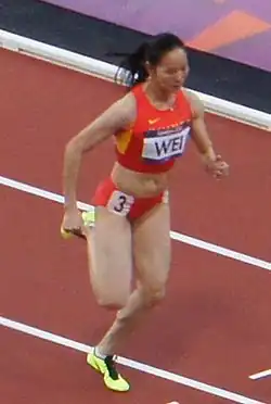 Wei Yongli Rang acht in 11,27&nbsp;s