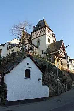 Haus Cuno (oben) und Wendelinuskapelle (unten)