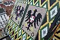 Die Wappen der Republik Österreich und der Stadt Wien am Albertinischen Chordach des Stephansdoms