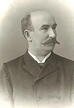 Wilhelm Trabert mit langem Schnurrbart und dunklem Anzug