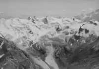 Roseggletscher, Piz Glüschaint. Historisches Luftbild von Werner Friedli (1964)